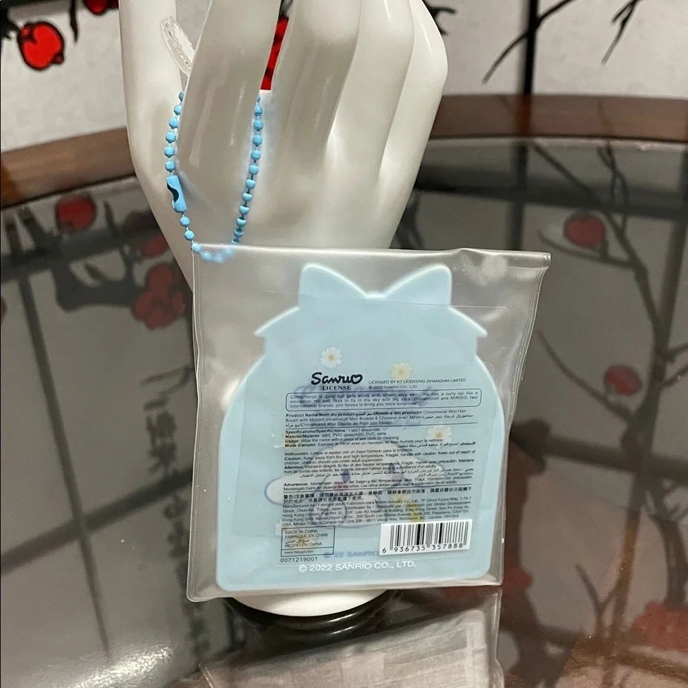 Sanrio Cinnamoroll Blue Handheld Mirror and Comb Set with Daisy Accents
